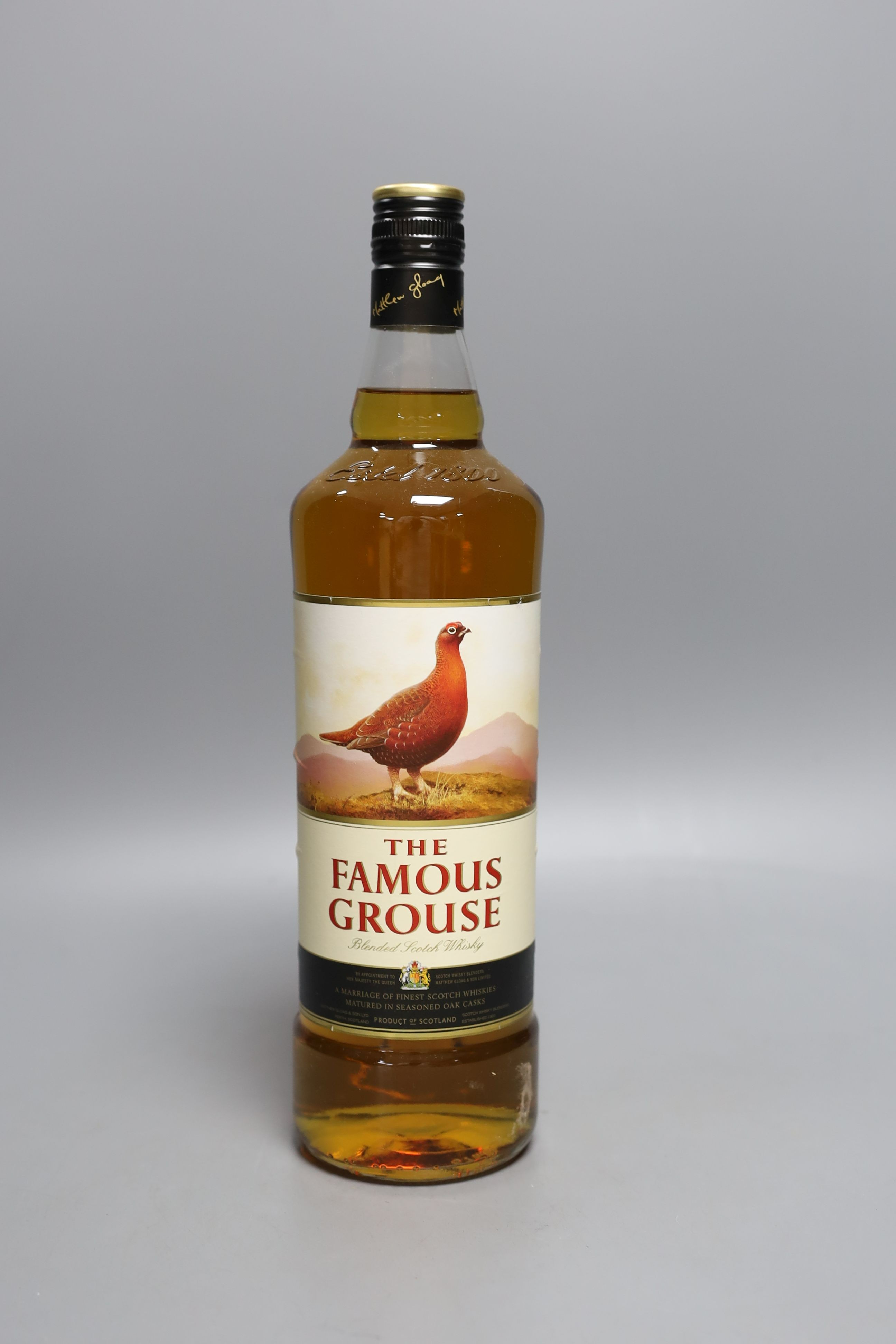 Eleven single litre bottles of The Famous Grouse scotch whisky